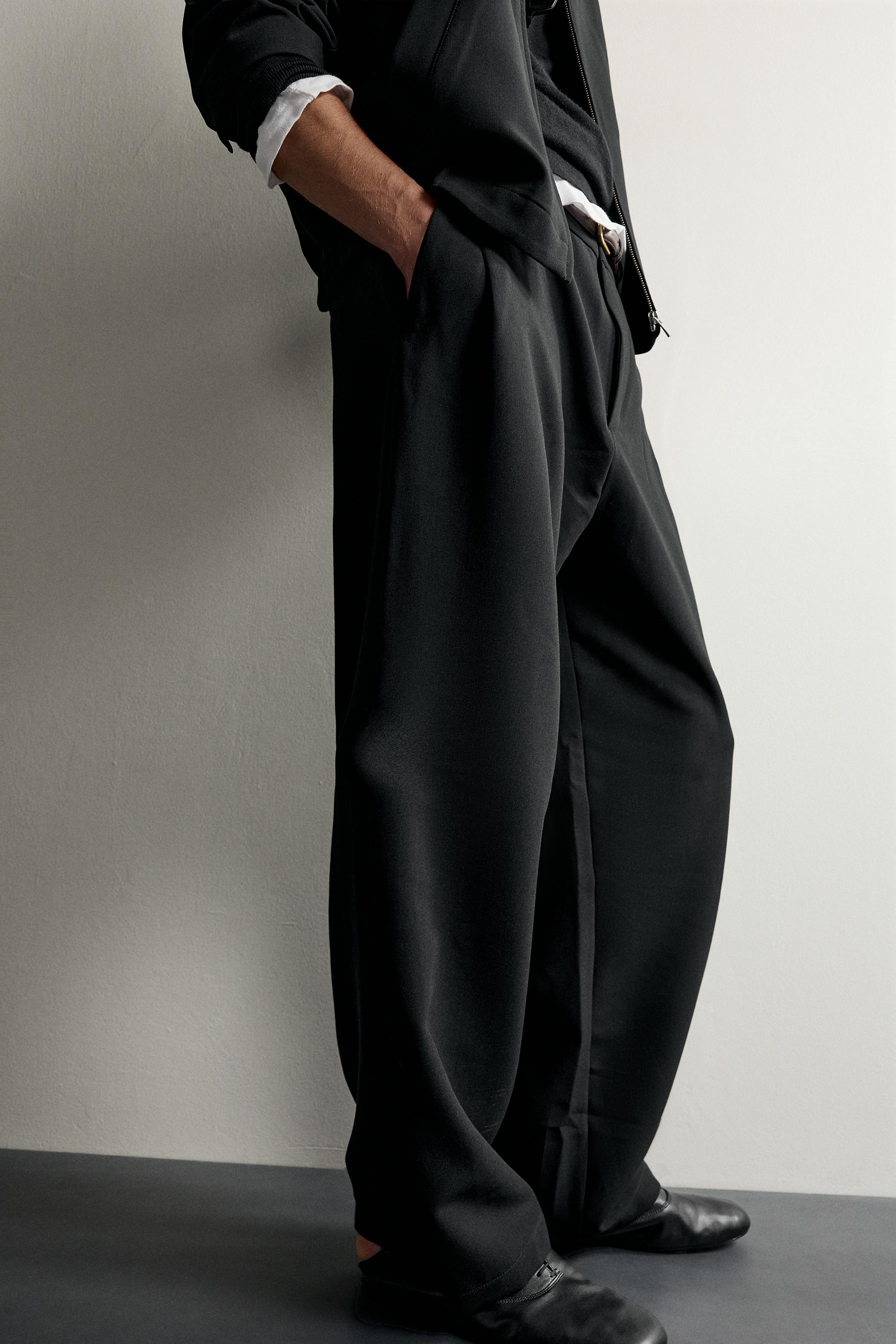 SIDE-PLEAT WIDE-FIT PANTS